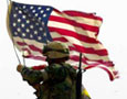 US soldier with American flag
